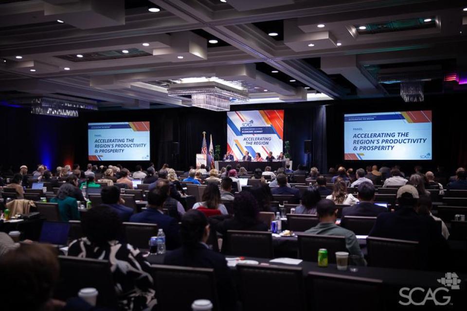 Panel presentations at the Economic Summit.